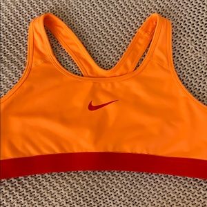 orange nike sports bra